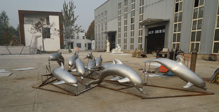 fabrication of the stainless steel Dophin Group sculptures Hilton Cabo Verde SAL Resort