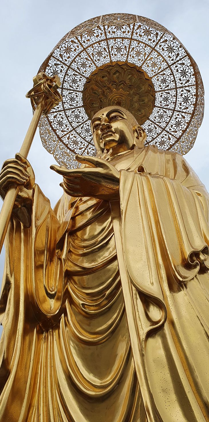 gold leaf foil buddha sculpture