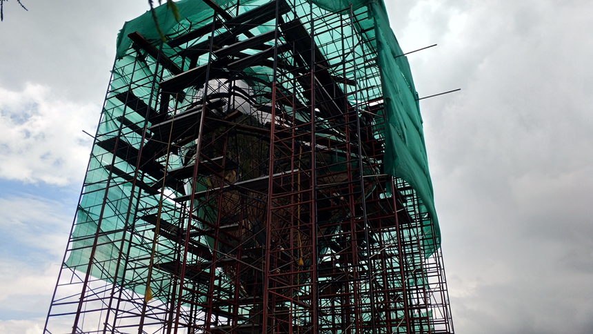 The LOVEME sculpture is hugged by scaffoldings for installation work.jpg