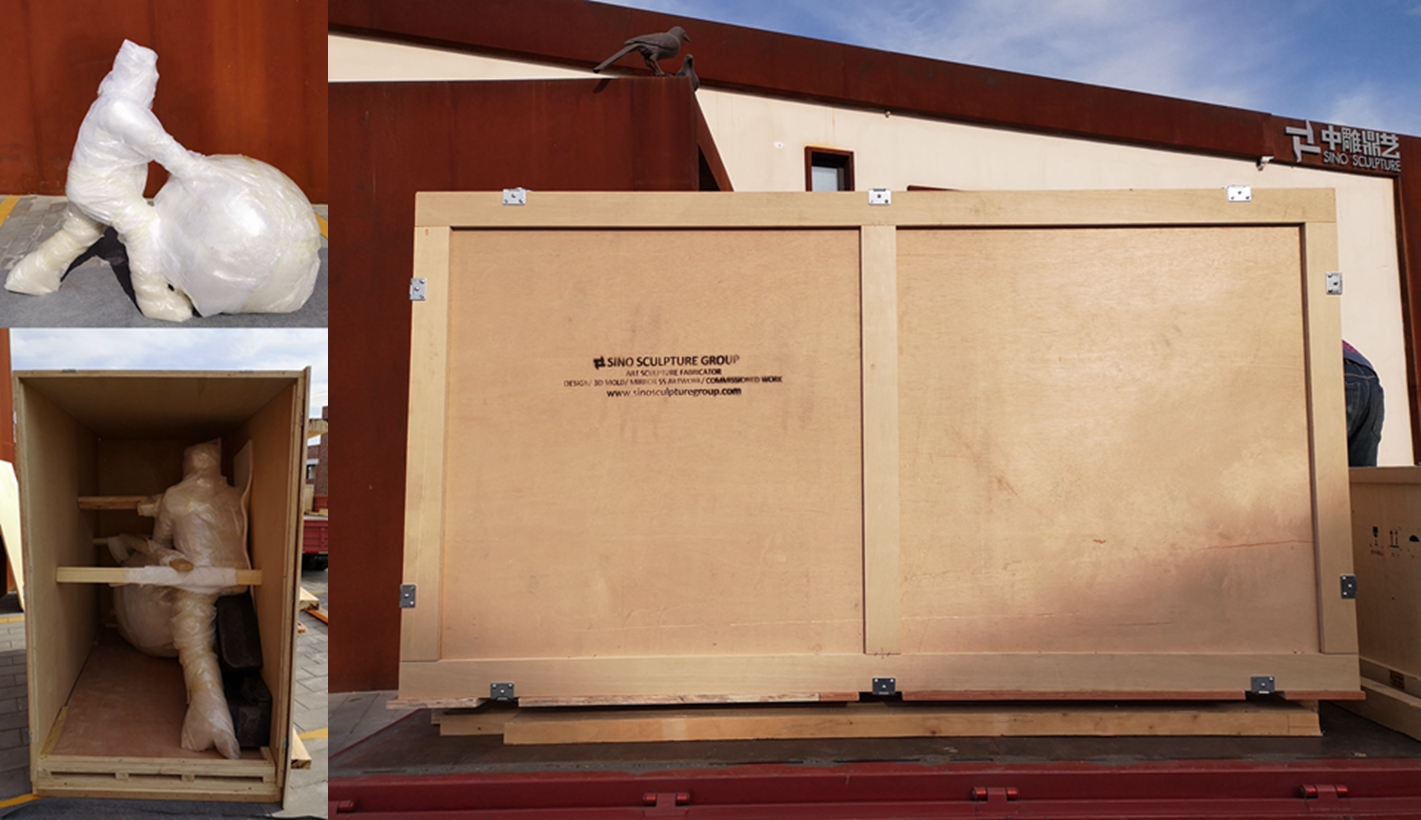 plywood pack and loading of the stainless steel Figure & Globe statue.jpg
