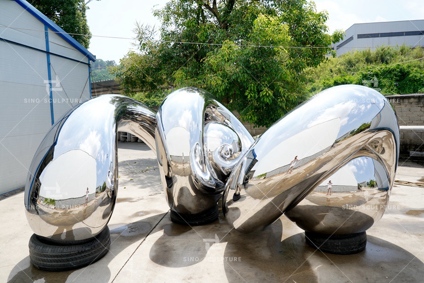 Mirror-Polished-Stainless-Steel-Unwind-Sculpture-Completion